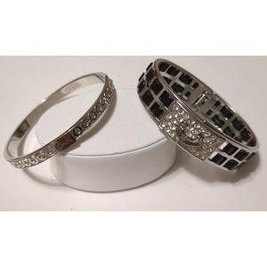 Beautiful Coach signature silver tone bangle and Juicy Couture bangle set